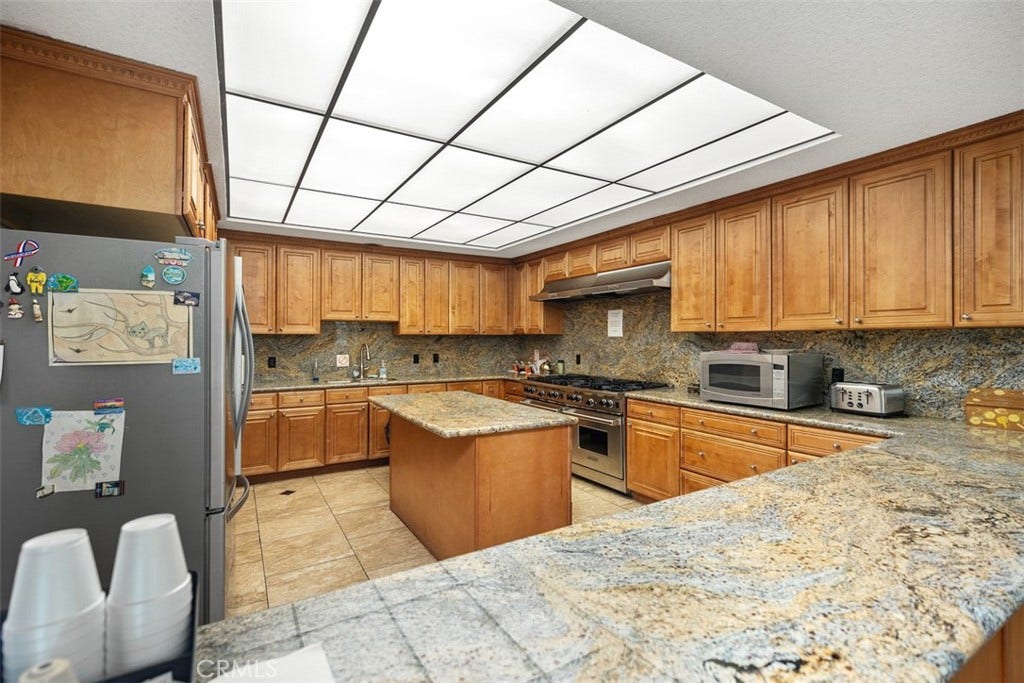 24701 Raymond Way, #135, Lake Forest, CA 92630 Large kitchen and bar area.