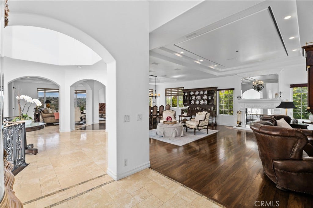 14 Marana, San Clemente, CA 92673 This home makes a statement with soaring ceilings, architectural details, a dramatic barrel ceiling, illuminated art nspace.iches, and gracious living