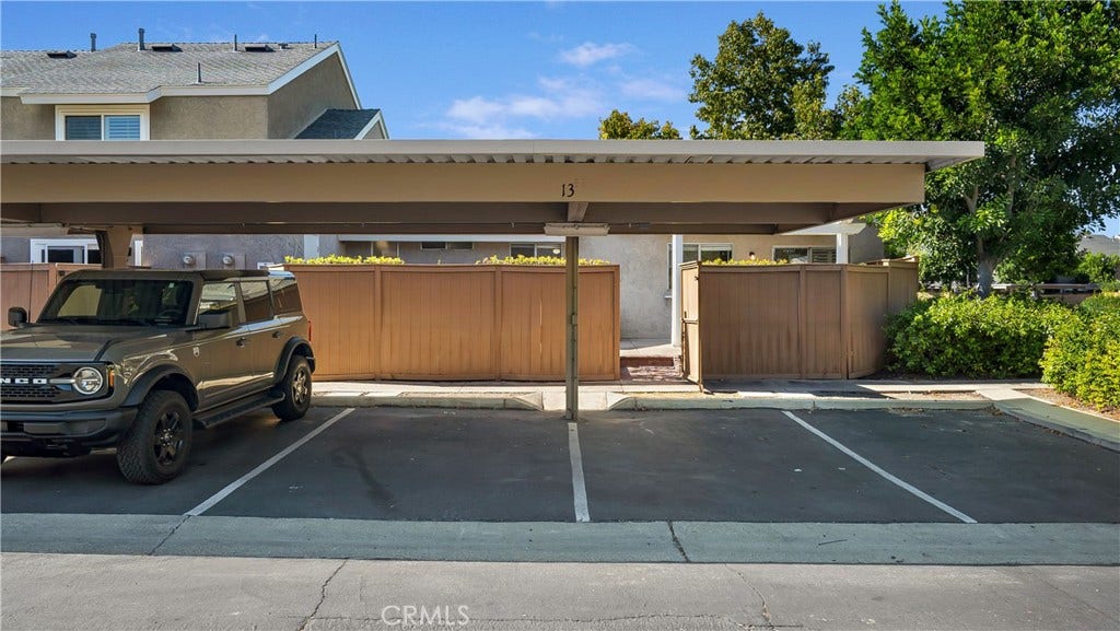 The last 2 parking spots on the right are for you.