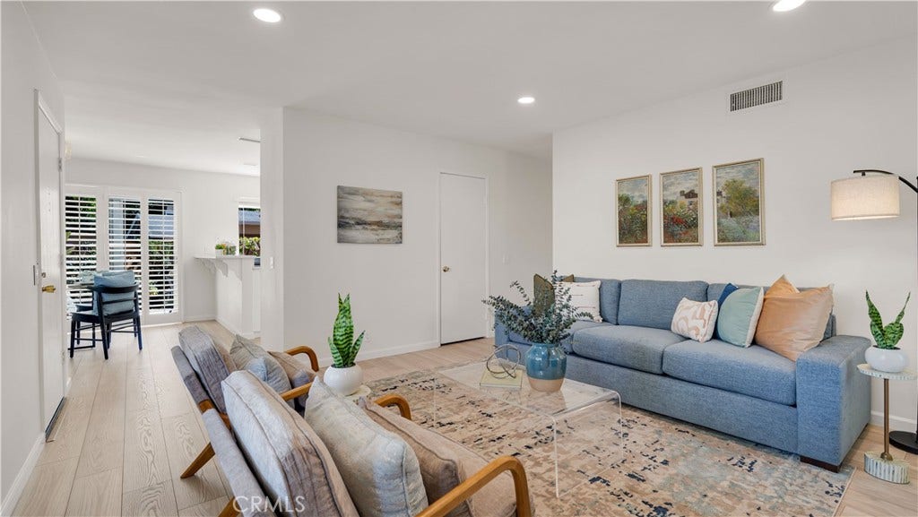 Just off the living room is the dining area and kitchen.