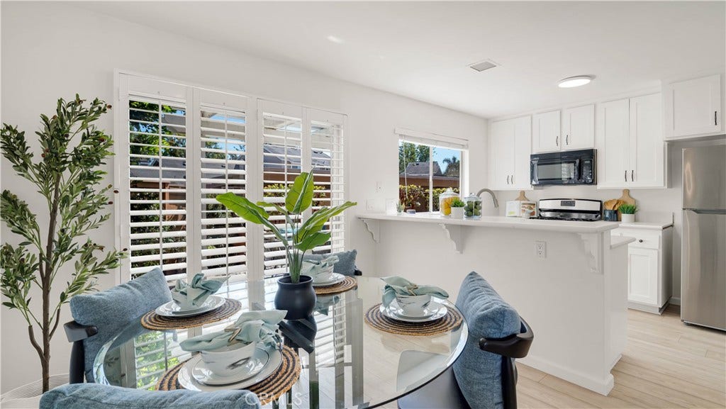 Eating in here, makes you feel good--plantation shutters let in bright light.