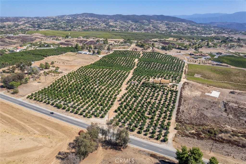 36733 Glenoaks, Temecula, CA 92592 Existing 23 + Acre Agricultural Grove Plus Estate Resident & and separate Guest Quarter & Storage- Potential Assemblage with Existing B&B in the Back & Adjacent 11 Acre lot with Unfinished Wine Tasting Terrace with 5 Acres of Vineyard