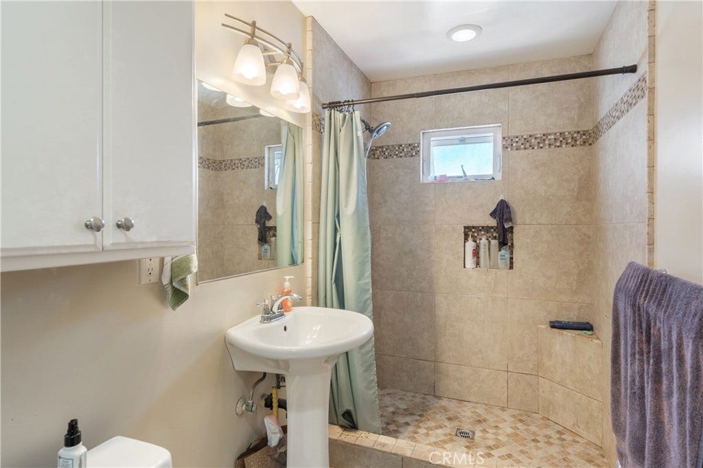 Upstairs bathroom with upgraded tiles