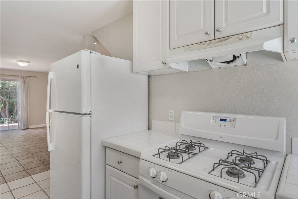Sparkling white kitchen downstairs