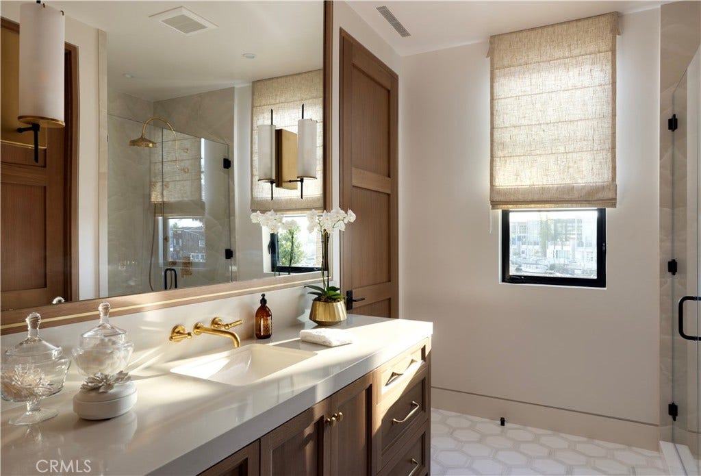 Secondary primary bath with custom finishes.