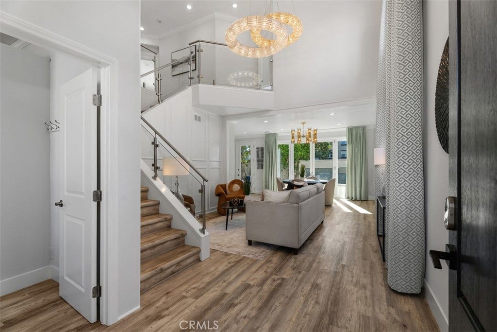 11 Calle Del Mar, Rancho Santa Margarita, CA 92688 Dramatic two-story entry opens to a bright, beautifully updated interior with modern finishes throughout.