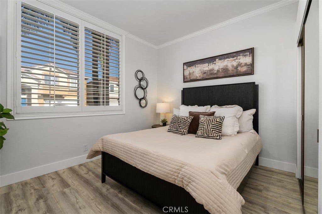 11 Calle Del Mar, Rancho Santa Margarita, CA 92688 Bright first floor bedroom or office with plantation shutters, updated flooring and generous closet space.