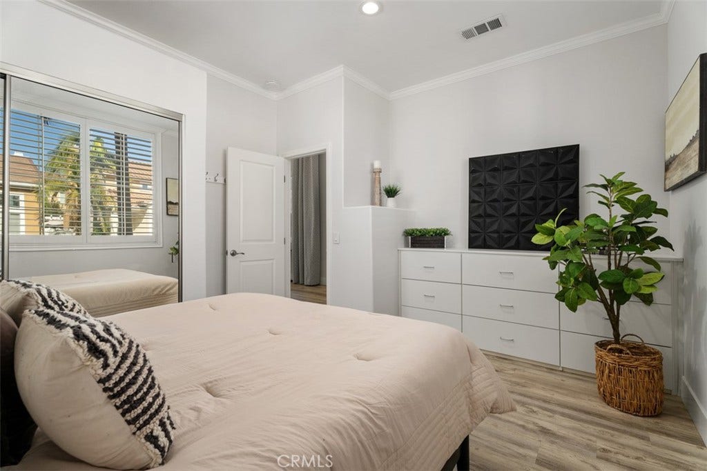 11 Calle Del Mar, Rancho Santa Margarita, CA 92688 Flexible bedroom or home office offers built-in storage and plenty of natural light.