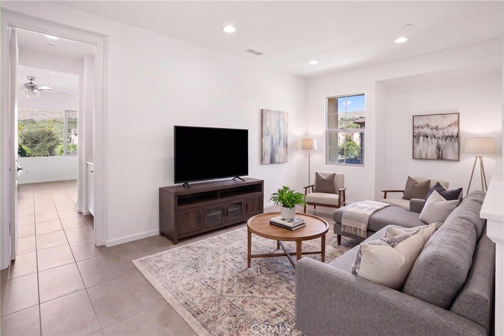 28242 Camino Del Rio, San Juan Capistrano, CA 92675 VIRTUALLY STAGED Upstairs loft shown as a comfortable secondary living area, highlighting the versatility and generous space.