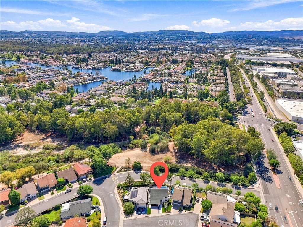 24396 Calle Pequeno, Lake Forest, CA 92630 Aerial view highlighting lake access