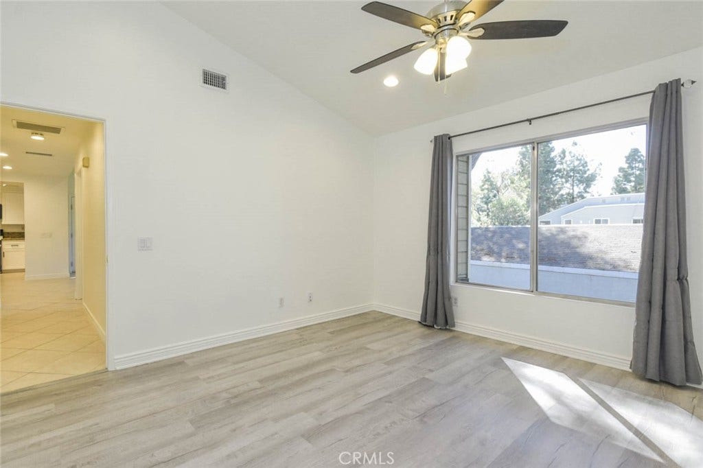 23472 Cambridge Road, #297, Yorba Linda, CA 92887 Primary bedroom with high ceiling.