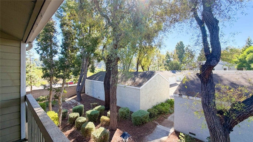 23472 Cambridge Road, #297, Yorba Linda, CA 92887 No one is behind this property. Tree-top view with privacy.