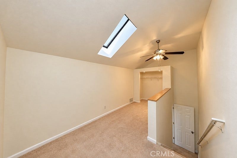 third bedroom with skylight that opens