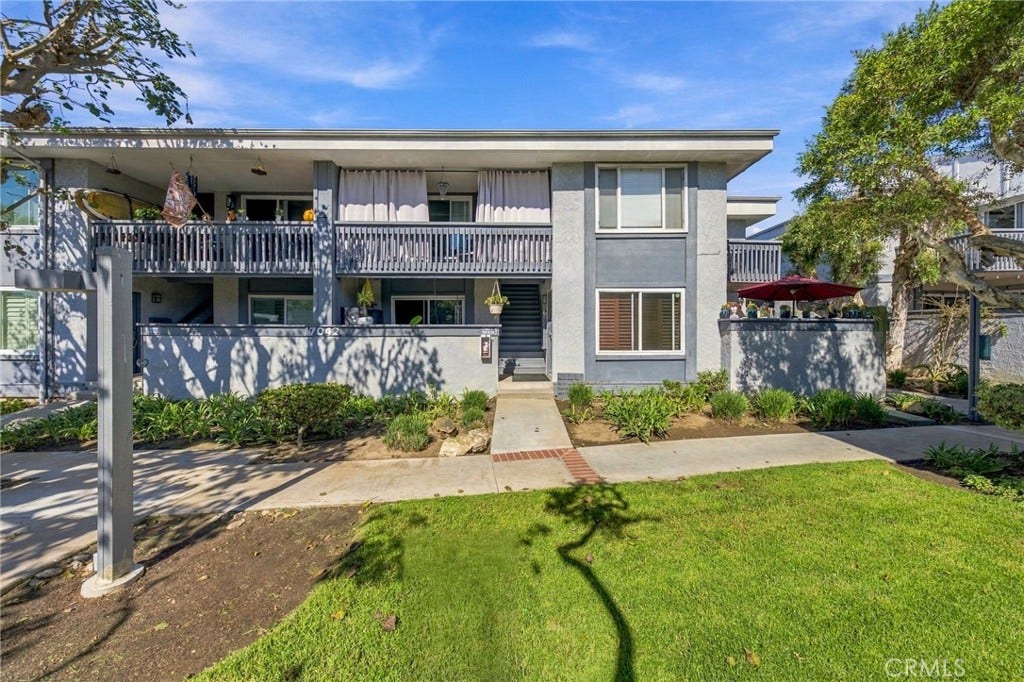 Located on the far right, upper level end unit