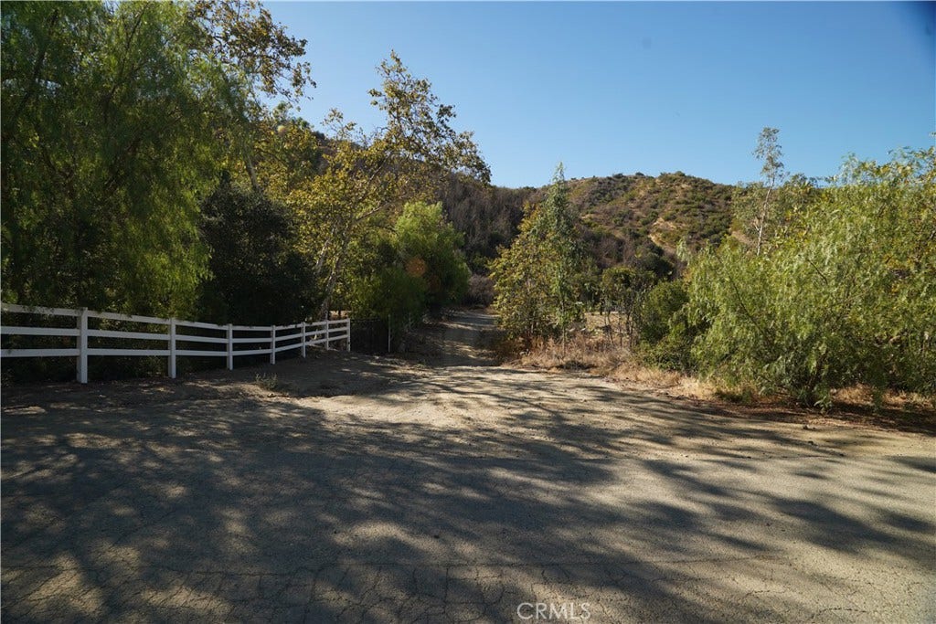16 Williams Canyon, Silverado, CA 92676 Turn right at this white fence. All dirt road uphill from here