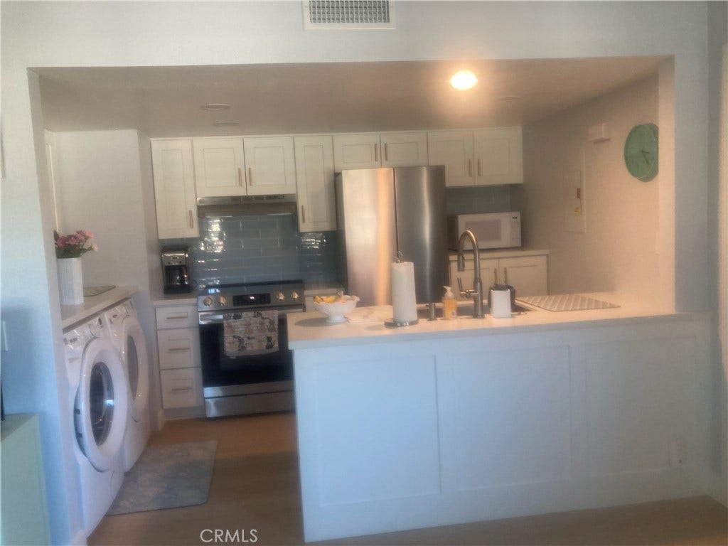full size washer& dryer and laundry counter