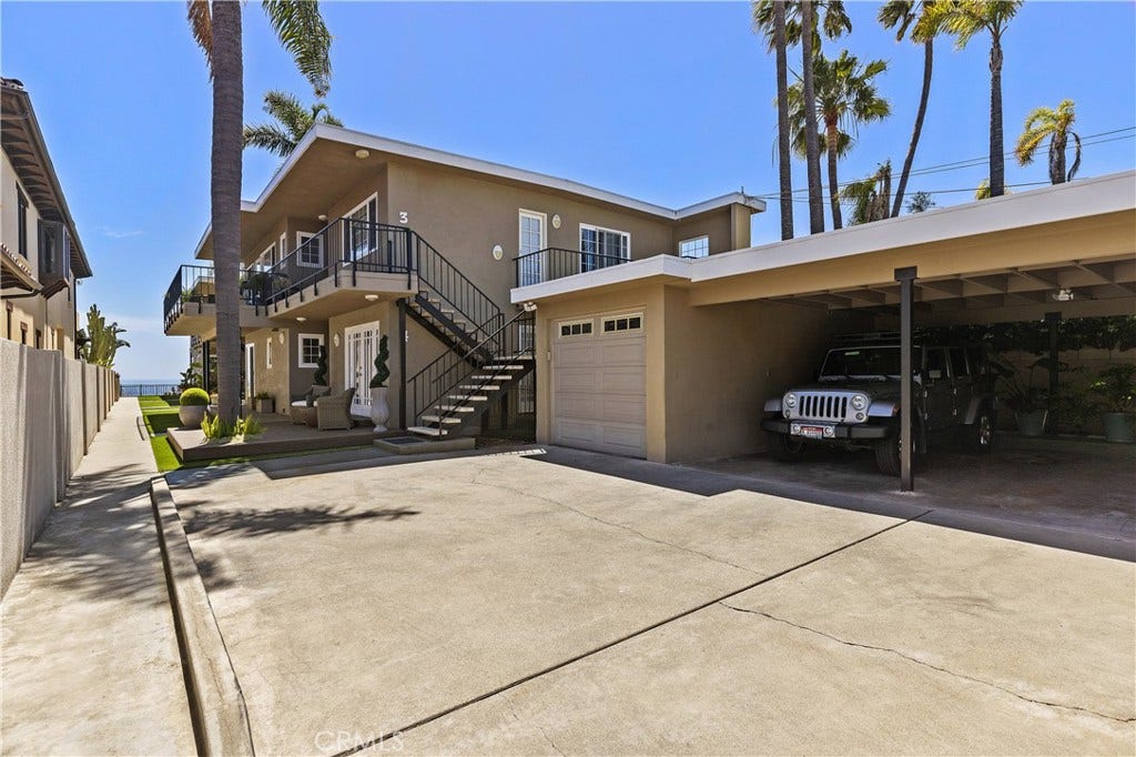 You get 1 Car Garage and 1 carport inside the gate