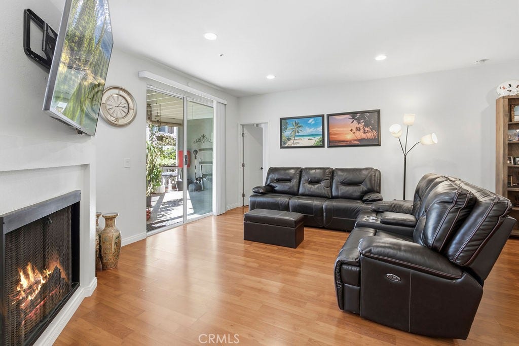 10361 Garden Grove Blvd, #12, Garden Grove, CA 92843 light and bright living room with fireplace