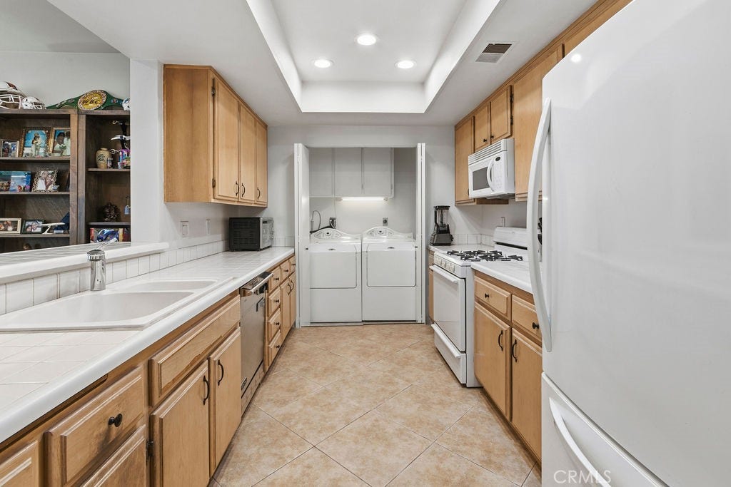 10361 Garden Grove Blvd, #12, Garden Grove, CA 92843 includes indoor laundry