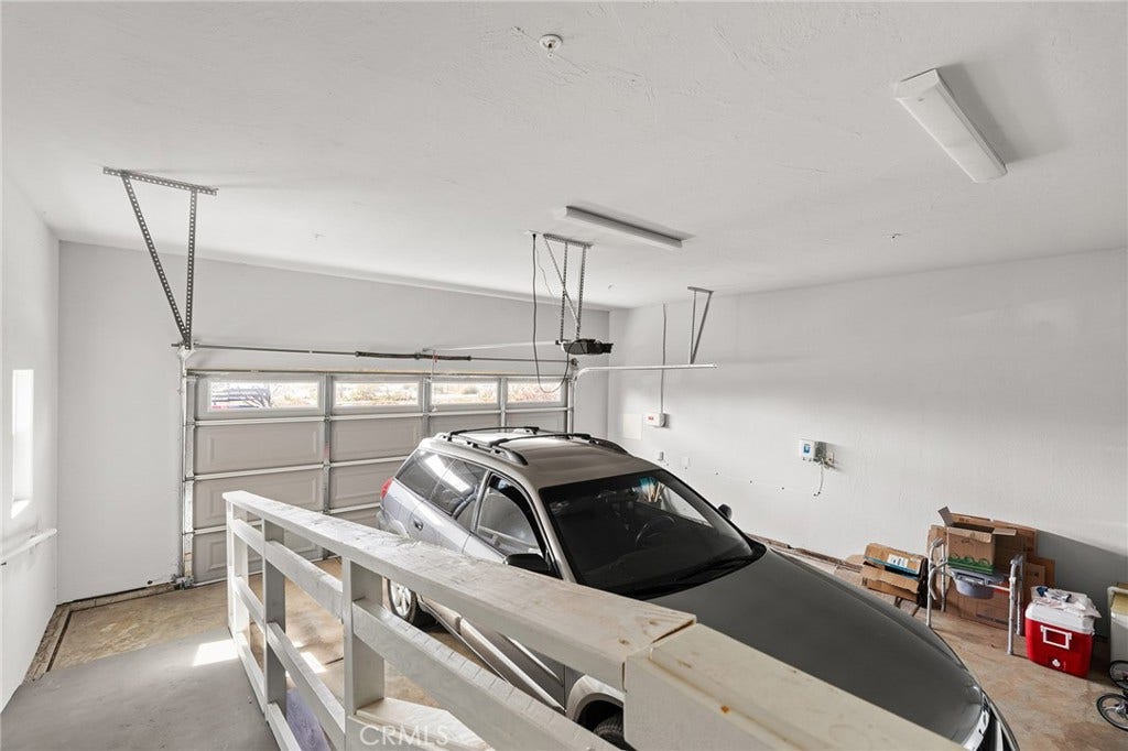 5548 Kemlyn Lane, Paradise, CA 95969 garage interior showing ramp up to door