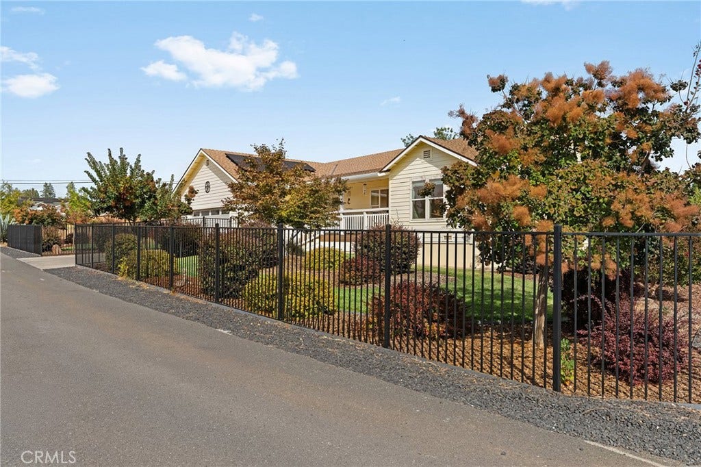 5548 Kemlyn Lane, Paradise, CA 95969 Showing private Kemlyn Lane & steel fencing