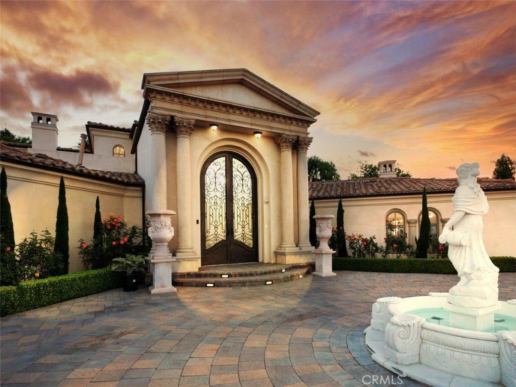 Front Entry & Fountain at Sunset