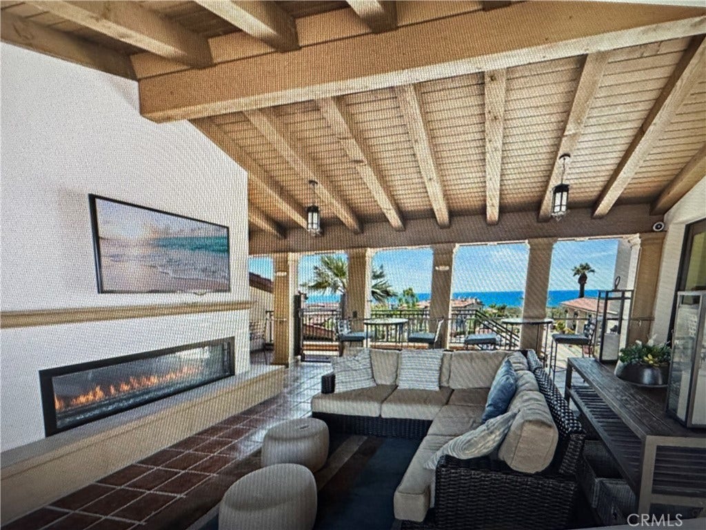 Upstairs loggia with fireplace