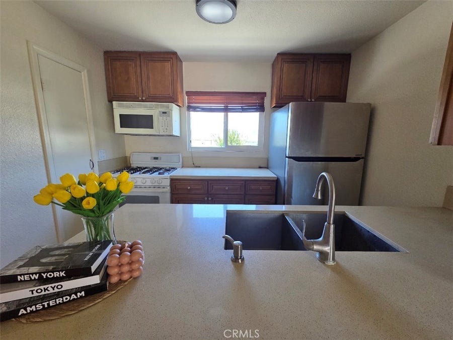 Property photo for 15317 Santa Gertrudes, #JJ101, La Mirada, CA