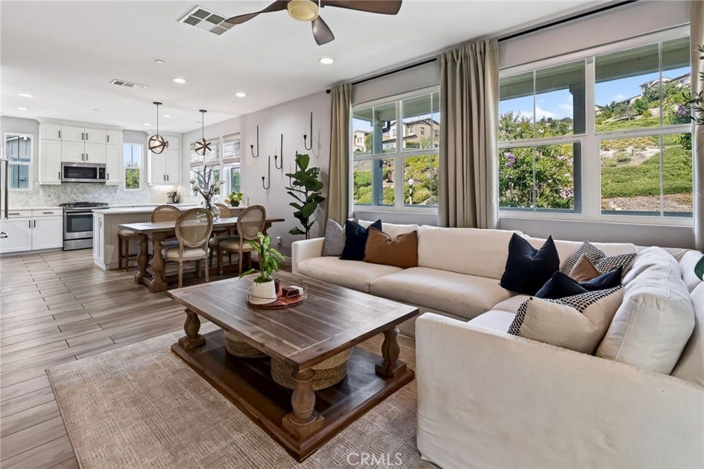 14 Marisol, Rancho Mission Viejo, CA 92694 Family Room and Kitchen have windows that look out at the beautiful hills.