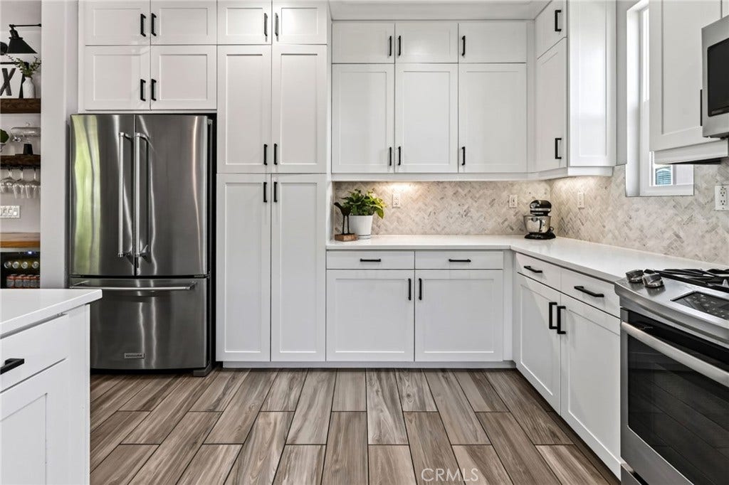 14 Marisol, Rancho Mission Viejo, CA 92694 Gorgeous luxury vinyl tile can be found in the kitchen as well as stainless steel appliances & lots of storage