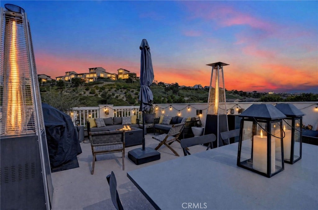 14 Marisol, Rancho Mission Viejo, CA 92694 Digitally enhanced twilight photo of the rooftop deck.