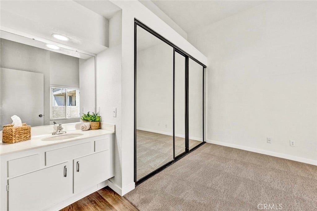 22 Aruba, Laguna Niguel, CA 92677 Primary bedroom with new carpet and mirrored closet doors