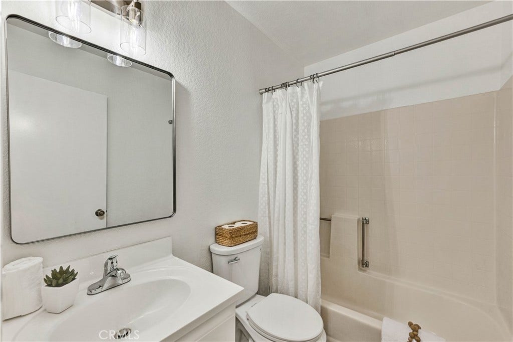 22 Aruba, Laguna Niguel, CA 92677 Updated guest bathroom with modern finishes and new fixtures.