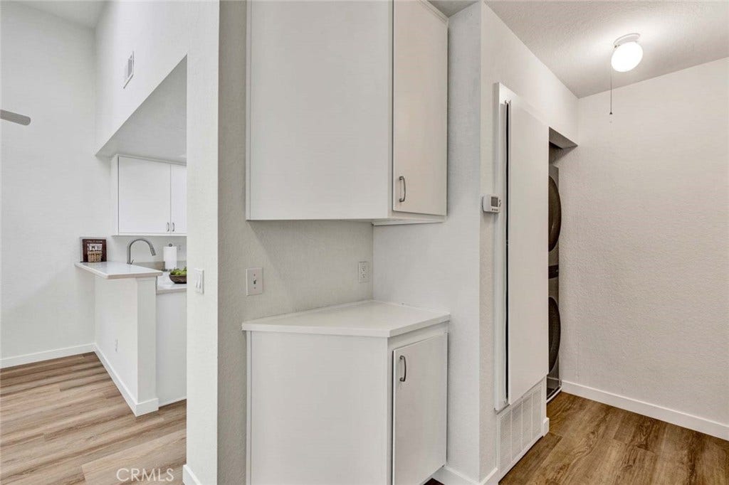 22 Aruba, Laguna Niguel, CA 92677 Laundry closet featuring an included washer and dryer.