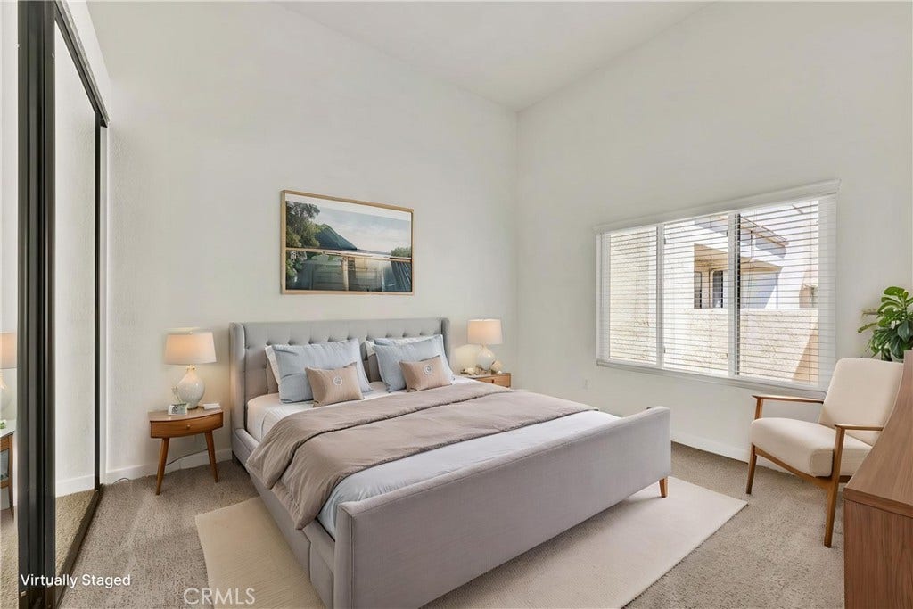 22 Aruba, Laguna Niguel, CA 92677 Professionally staged primary bedroom featuring a spacious layout, modern design, and a comfortable retreat atmosphere.