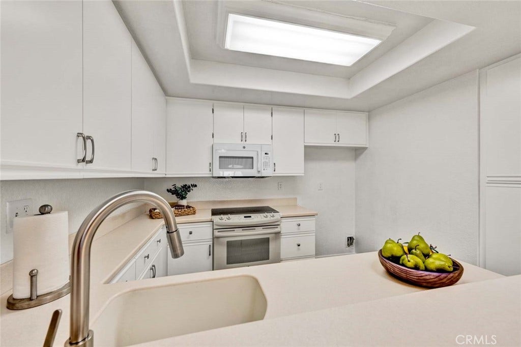 22 Aruba, Laguna Niguel, CA 92677 Modern, updated kitchen faucet featuring a sleek design and high-quality finish.