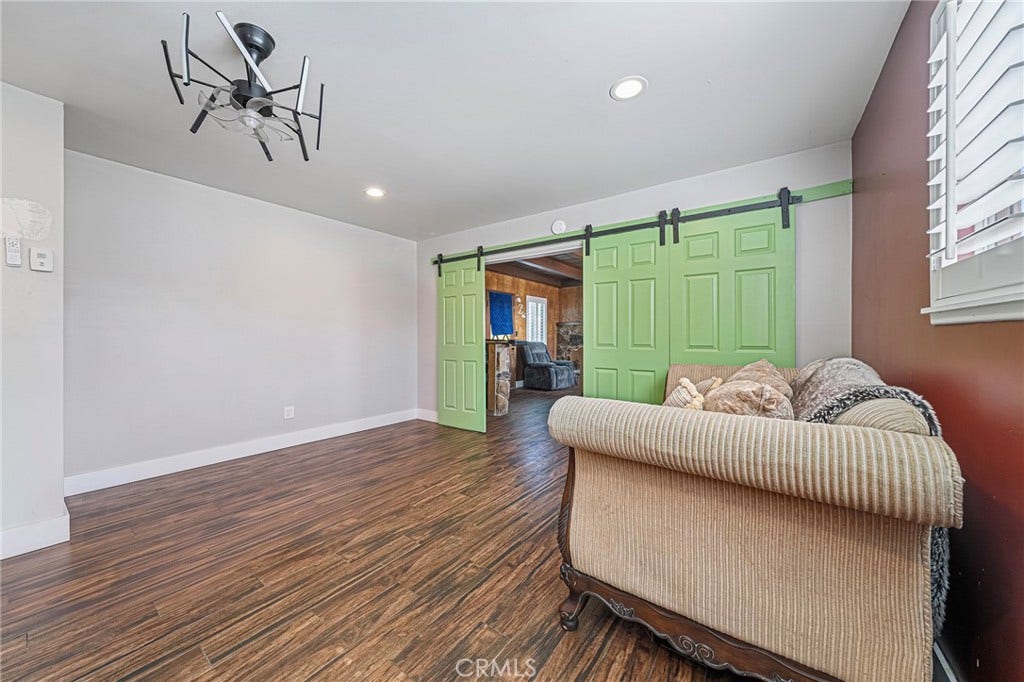 656 Sandy Hook, La Puente, CA 91744 Living room is behind the barn doors...