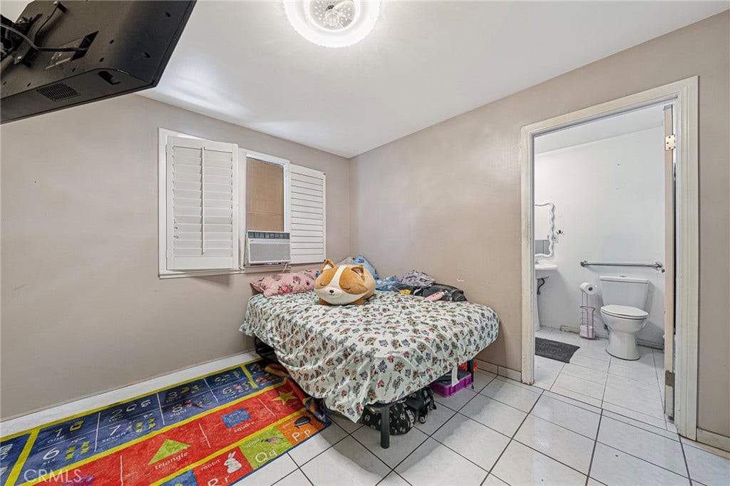 656 Sandy Hook, La Puente, CA 91744 Primary bedroom with en-suite bathroom...