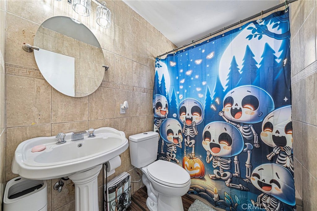656 Sandy Hook, La Puente, CA 91744 Hall bathroom which has been updated with custom tile...