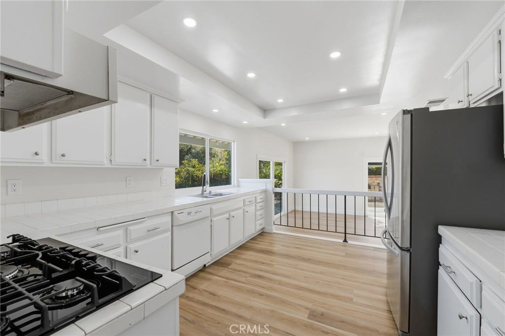 11739 Rancho Verde Drive, Whittier, CA 90601 Kitchen To Fam Room View