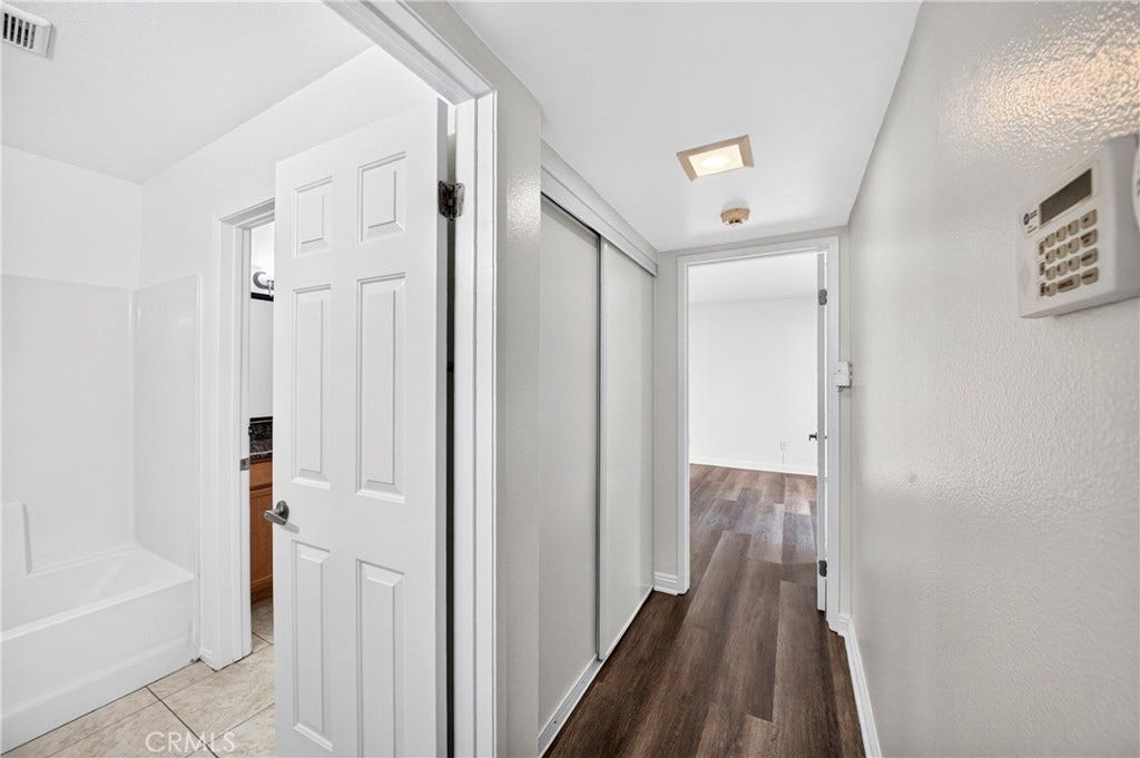 1315 Massachusetts Avenue, #103, Riverside, CA 92507 Hallway with double slider storage