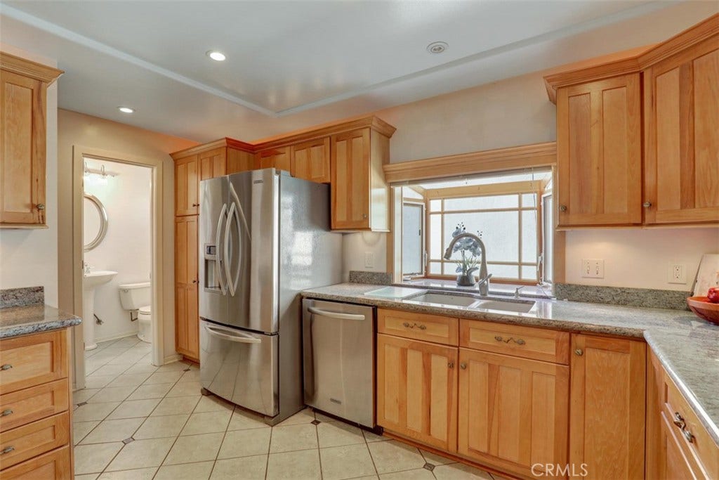 5021 Apollo Circle, Los Alamitos, CA 90720 Kitchen towards 1/2 bath.