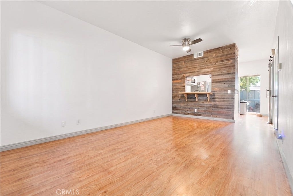926 W Philadelphia, #R99, Ontario, CA 91762 AI enhanced to show the home vacant.