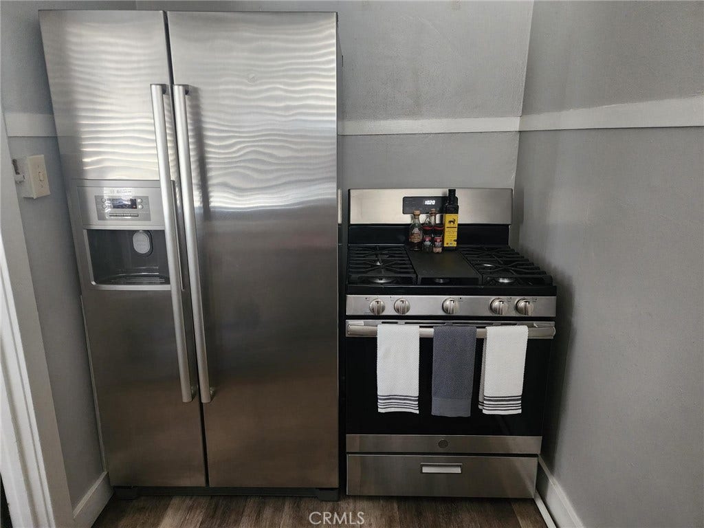Gas Stove and refrigerator included.
