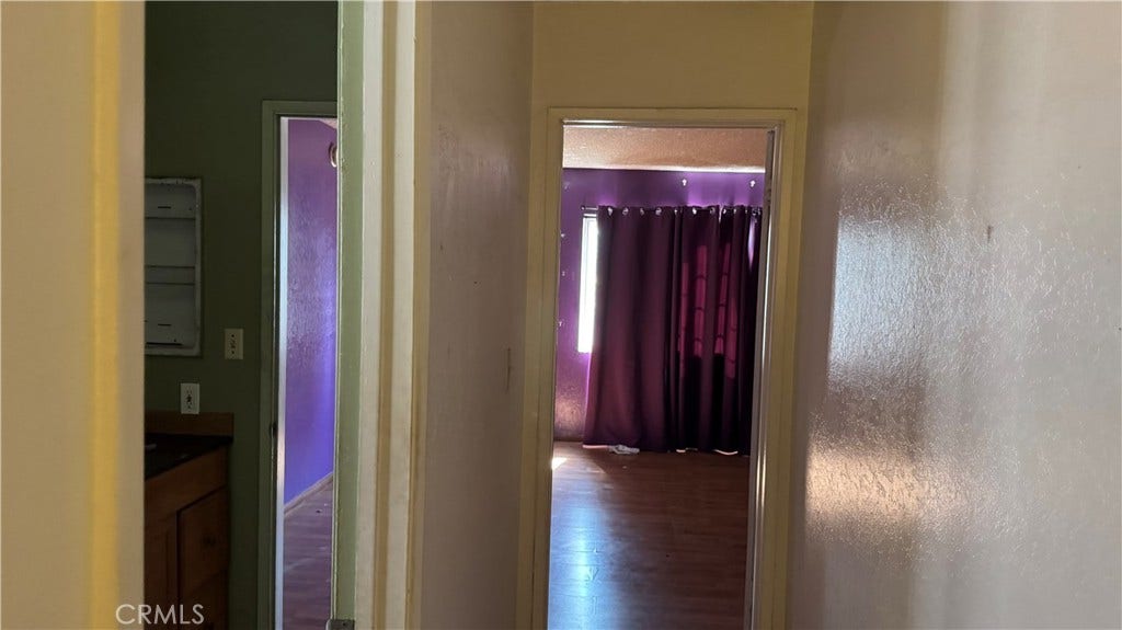Hall to 3rd upper room with view from front of home