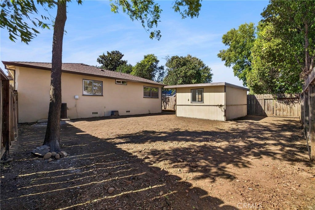 Looking at house from corner garden area