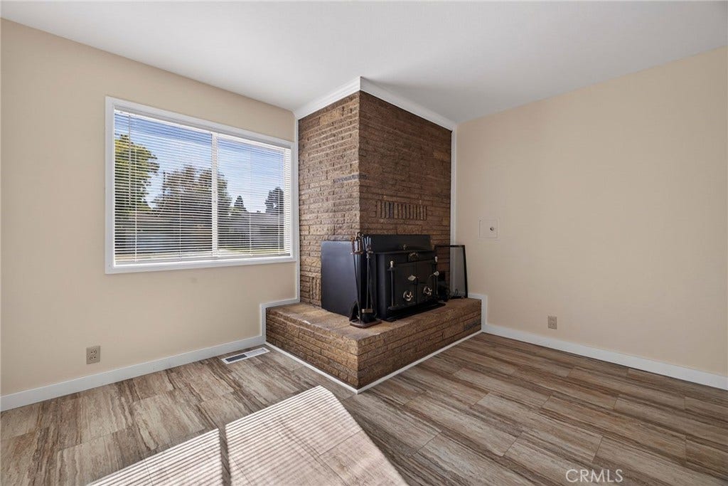 Fireplace to gather around in the family room