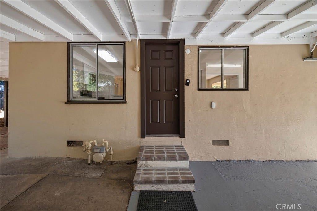 Easy access to family/kitchen area from garage