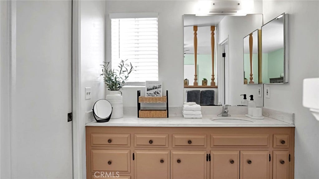 5503 Hayter, Lakewood, CA 90712 Master Bathroom and walk in closet with pocket door,