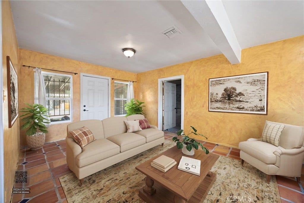 552 Pepper, Bakersfield, CA 93307 Digitally staged sitting room